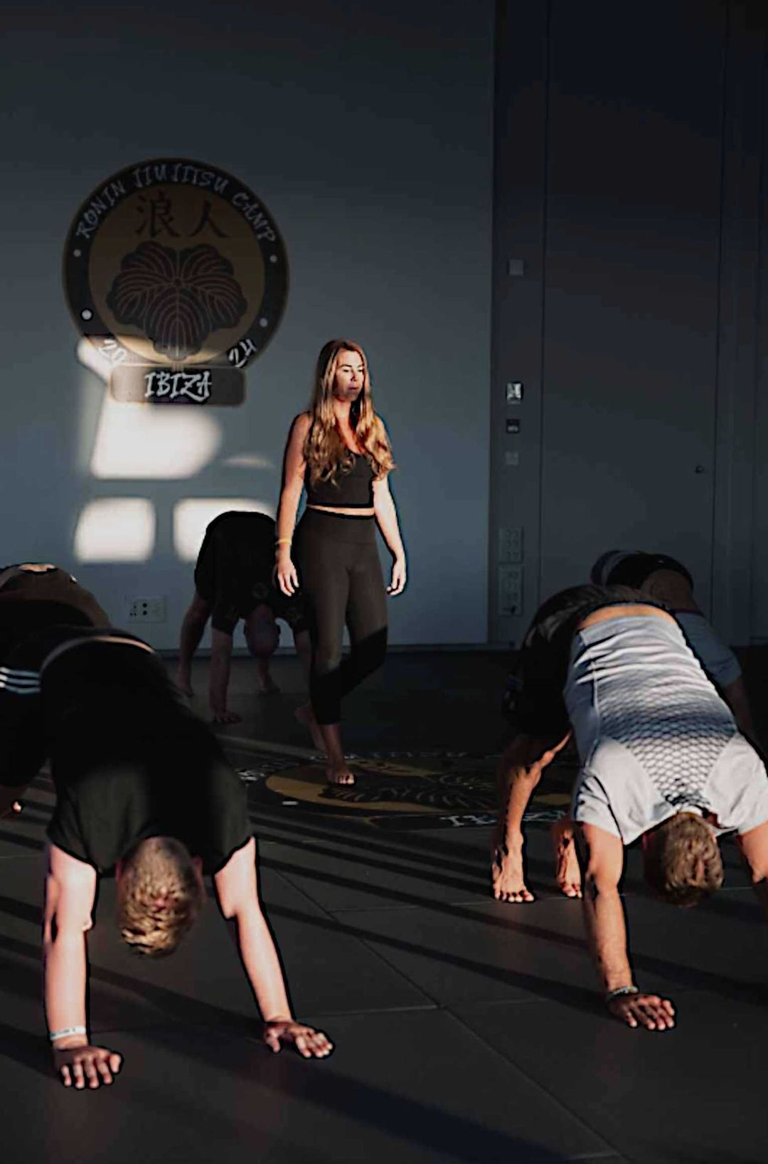 Stine teaching Vinyasa yoga class at Heat Lagos studio