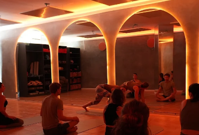 Heat Lagos yoga studio interior infrared heated class session Lagos Portugal teacher training